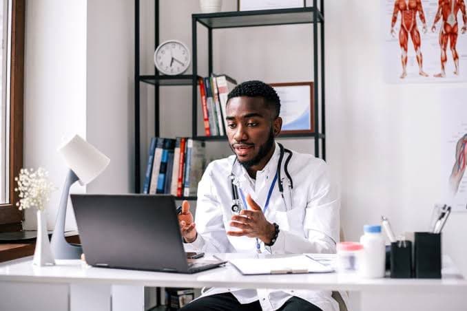 Healthcare professional consulting with patient